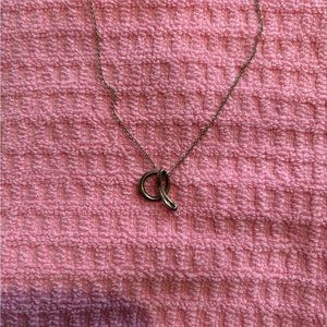Tiffany & Co. sterling silver “a” pendant and chain.